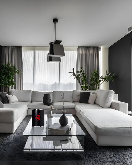Shisha Turbine NeXt Premium Coal Burner in a modern living room, black edition.

