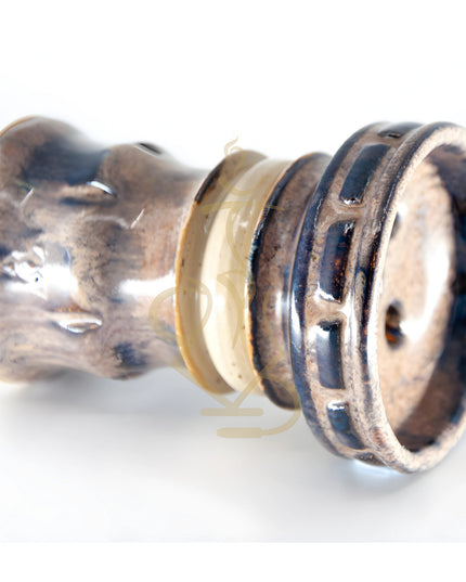 Closeup view of the Tuan Mini Killer Hookah Bowl, showing intricate details.